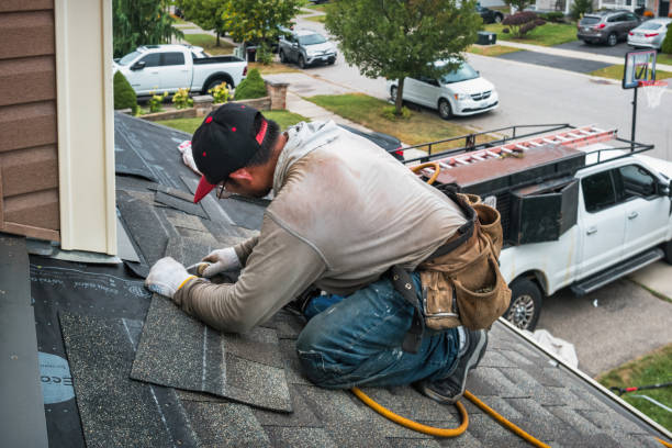Professional Roofing technician working in Vernon, MI